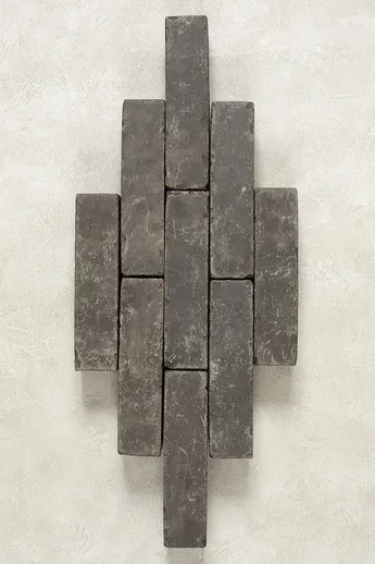 5 rows of 9 dark grey Amersham Belgian Brick Pavers arranged in lozenge shape Part of the Alpha Clay Paving collection.