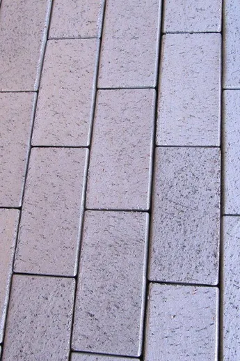 Close view of delta Blue Driveway Pavers laid without mortar in running bond pattern. Free UK delivery available.